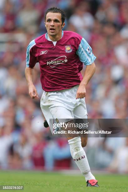 September 24: Matthew Etherington of West Ham United running during the Premier League match between West Ham United and Arsenal at Upton Park on...