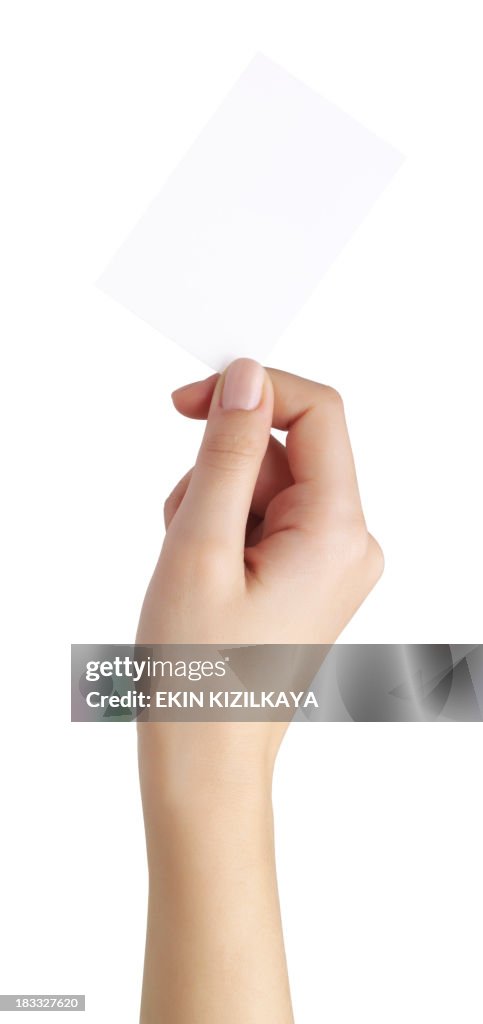 Empty business card in a woman's hand