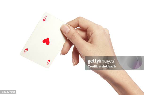 ace of hearts in woman hand - hearts playing card stock pictures, royalty-free photos & images