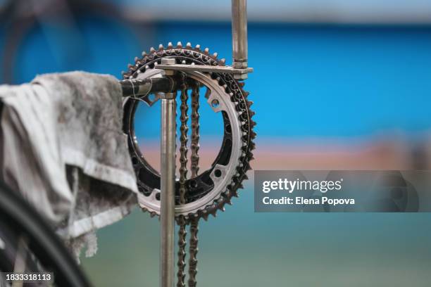 abstract sports backgrounds. close-up cycling details - gears, sprockets and chain in bicycle workshop - bearings metal stock pictures, royalty-free photos & images