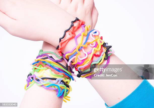 lots o bands - rubber bracelet stock pictures, royalty-free photos & images