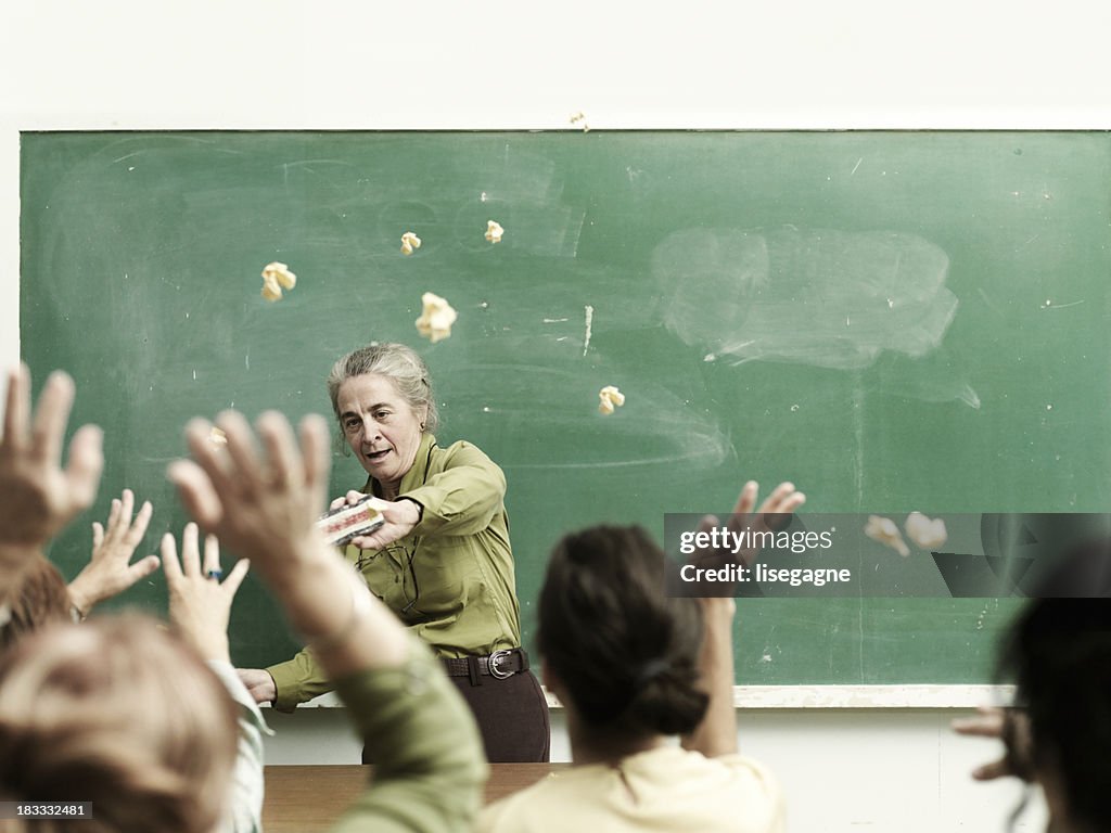 Students throwing papers