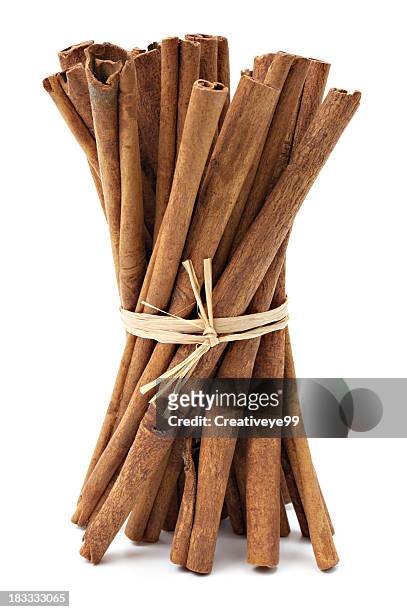 cinnamon sticks - herb bundle stock pictures, royalty-free photos & images