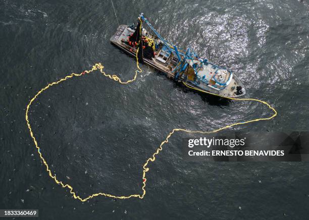 Aerial image of an anchovy fishing boat fishing 5 miles from the shore off Lima on November 19, 2023. El Niño, the climatic phenomenon that...