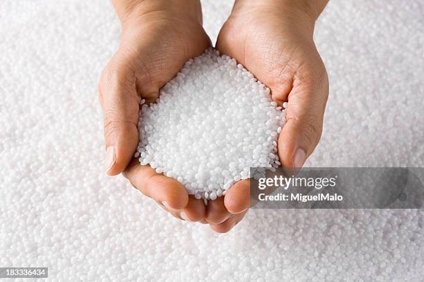 plastic resin pellets - human hand circle stock pictures, royalty-free photos & images