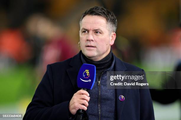 Pundit and former footballer, Michael Owen looks on as he speaks prior to the Premier League match between Wolverhampton Wanderers and Burnley FC at...