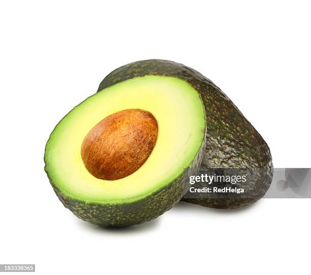 avocados with pit - avocado bildbanksfoton och bilder