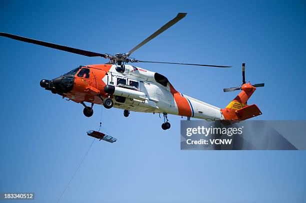 guarda costeira de helicóptero - hastear - fotografias e filmes do acervo