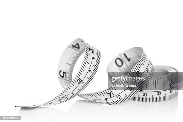 tape measure on white background - centimeter stockfoto's en -beelden