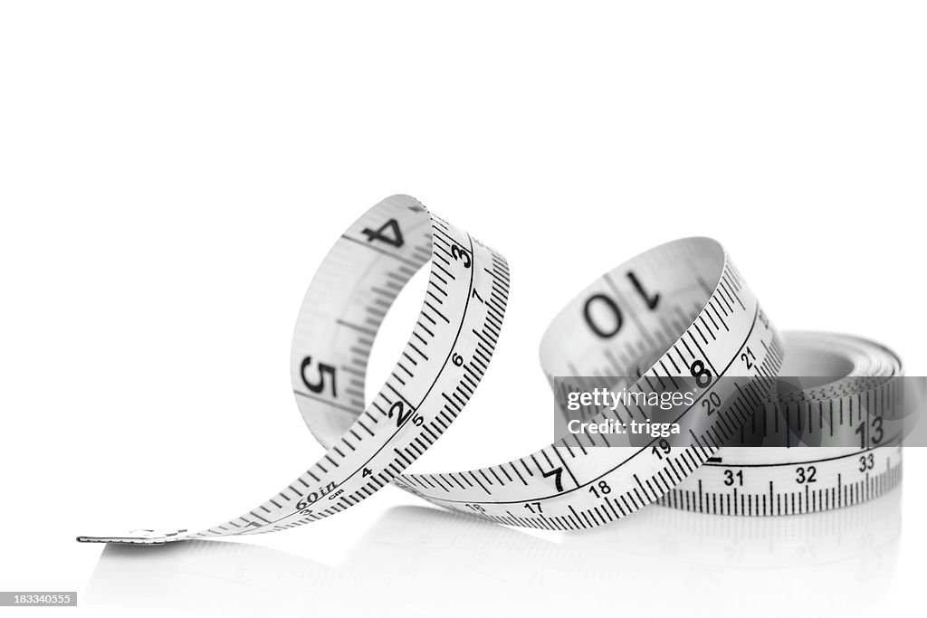 Tape measure on white background