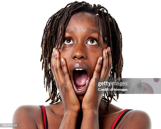 shocked gasping young woman with hands on cheeks - native african girls 個照片及圖片檔