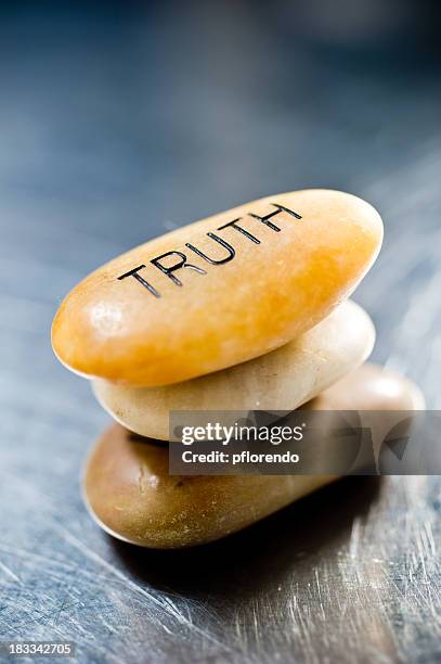 three smooth, stacked stones with the top one saying truth - respect word stock pictures, royalty-free photos & images