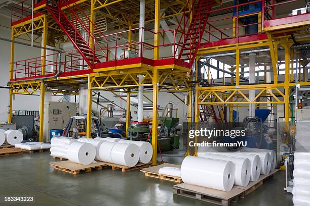 plastic factory - plastic folie stockfoto's en -beelden