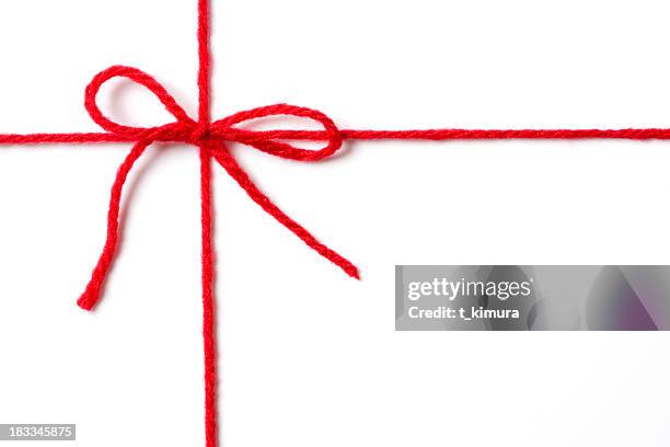 red ribbon - rode draad stockfoto's en -beelden