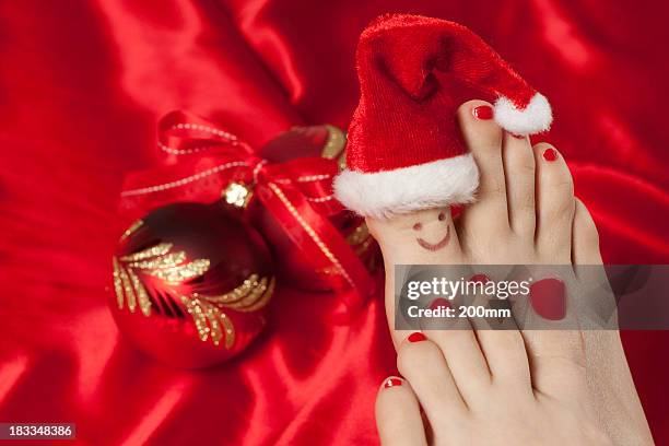 christmas-englische redewendung - feet christmas stock-fotos und bilder