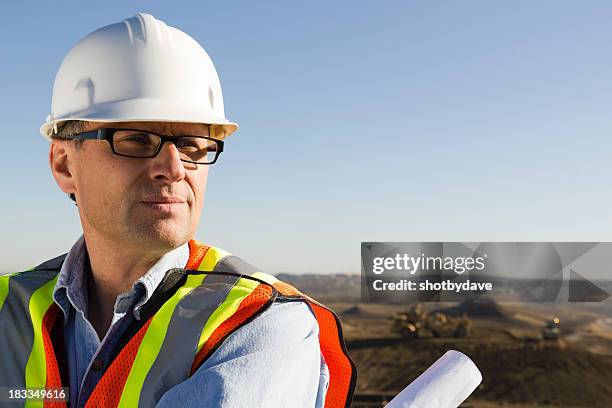 architect on site - mining helmet stock pictures, royalty-free photos & images