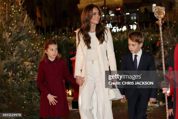 Britain's Catherine, Princess of Wales , Britain's Princess Charlotte of Wales and Britain's Prince George of Wales arrive to attend the "Together At...