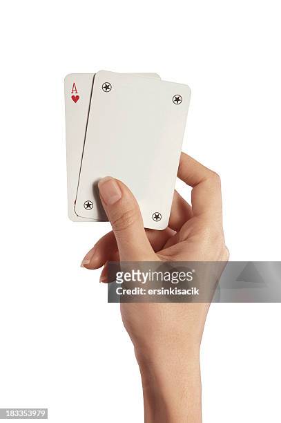playing cards in woman hand (ace and joker) - joker card stockfoto's en -beelden