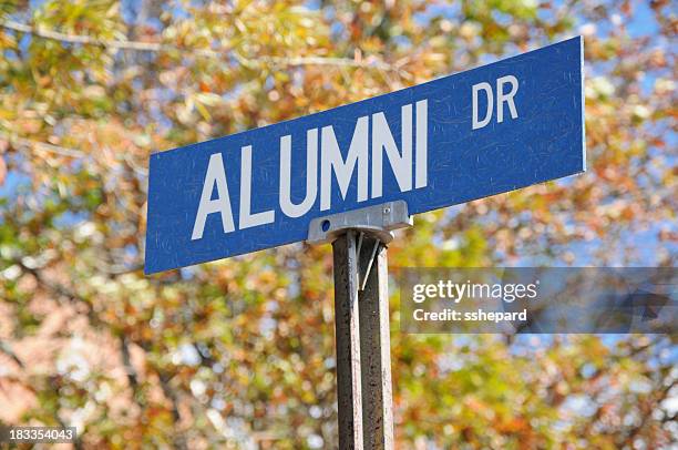 alumni drive street sign close up - alumni bildbanksfoton och bilder