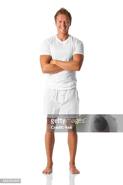 isolated male standing in boxers and a tee shirt - barefoot men 個照片及圖片檔