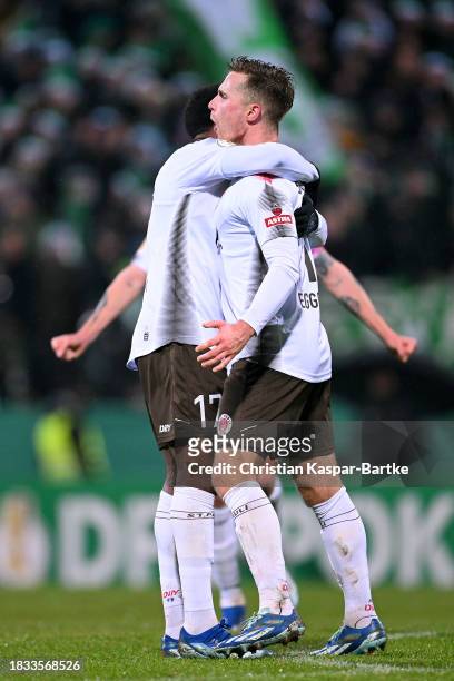 Johannes Eggestein of FC St. Pauli celebrates after scoring the team's fourth goal with teammates during the DFB cup round of 16 match between FC 08...