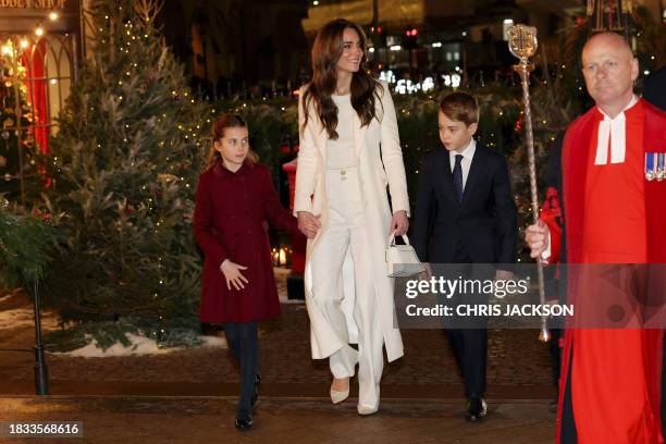 Britain's Catherine, Princess of Wales , Britain's Princess Charlotte of Wales and Britain's Prince George of Wales arrive to attend the "Together At...