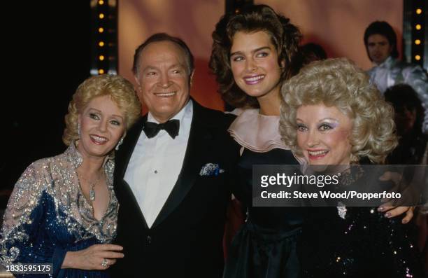 Stars including Debbie Reynolds and Brooke Shields pose for photographs during the recording of 'Bob Hope's Royal Birthday Party', a TV special...