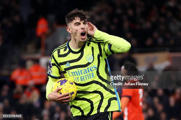Kai Havertz of Arsenal celebrates after scoring the team's third goal during the Premier League match between Luton Town and Arsenal FC at Kenilworth...