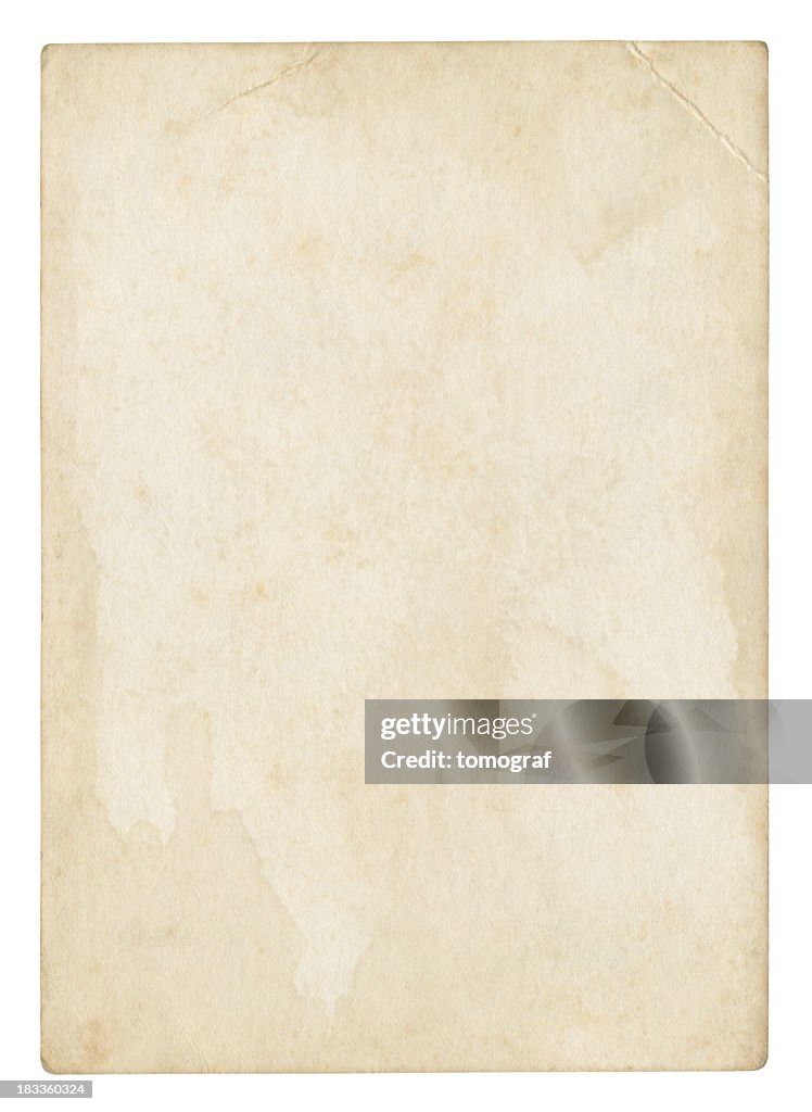 An old stained blank piece of beige paper