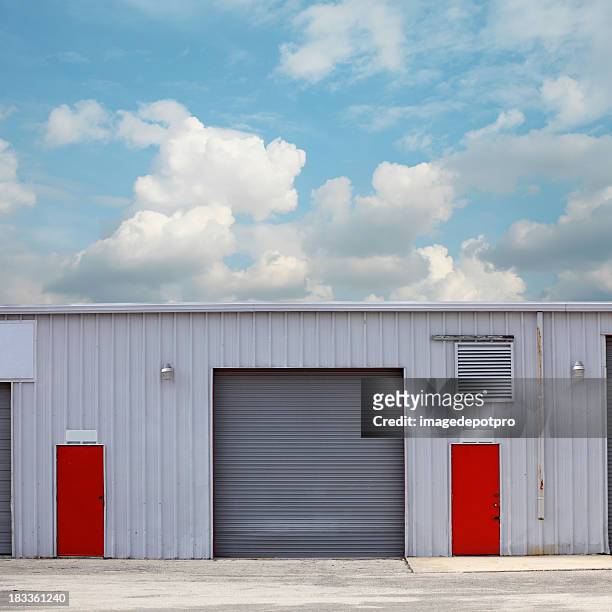 warehouse - industrial doors stock pictures, royalty-free photos & images