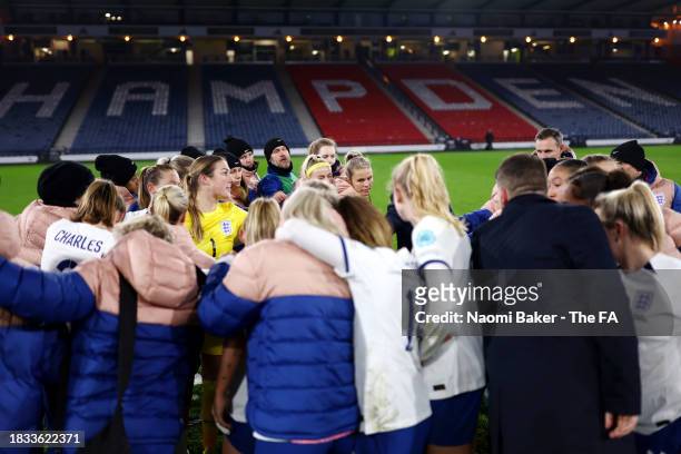 Players of England huddle following the UEFA Womens Nations League match between Scotland and England at Hampden Park on December 05, 2023 in...