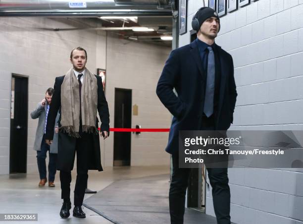 Artemi Panarin of the New York Rangers and teammate Chris Kreider arrive at the arena for an NHL game against the Ottawa Senators at Canadian Tire...