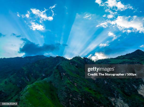 low angle view of mountain against sky - the storygrapher fotografías e imágenes de stock