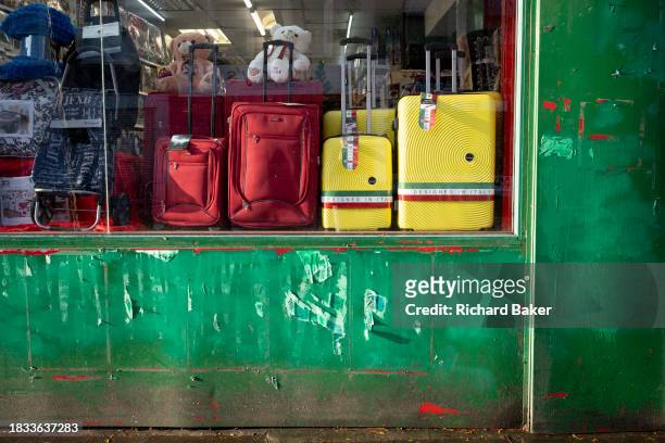 Suitcases designed in Italy, an EU member state, plus other home items are on display in a south London home stores shop, on 8th December 2023, in...