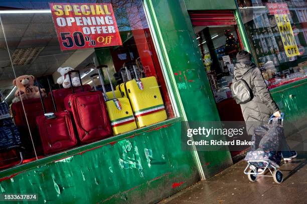 Suitcases designed in Italy, an EU member state, plus other home items are on display in a south London home stores shop, on 8th December 2023, in...