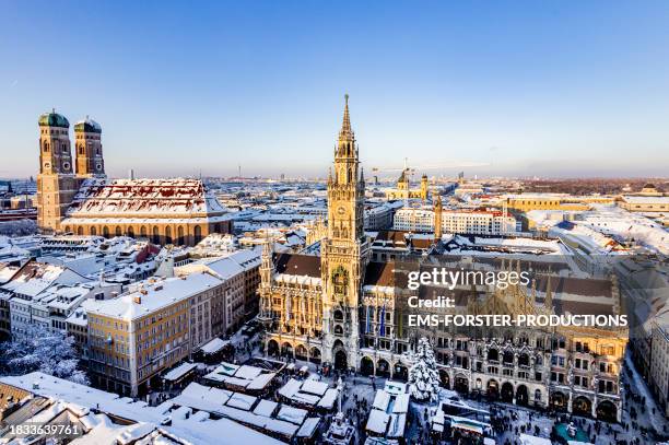 new town hall of munich - marienplatz during daytime from above beside frauenirche - munich stock pictures, royalty-free photos & images