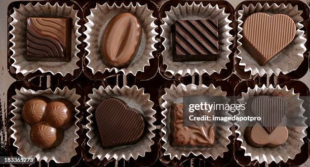 fresh chocolates - close up of chocolates for sale stock pictures, royalty-free photos & images