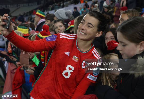 Angharad James of Wales meets fans following the UEFA Womens Nations League match between Wales and Germany at Swansea.com Stadium on December 05,...