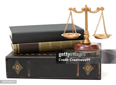 Law books and scales of justice Law books and scales of justice