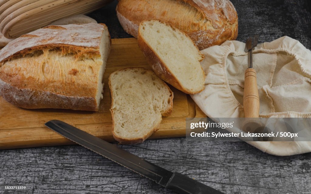 High angle view of bread on cutting board