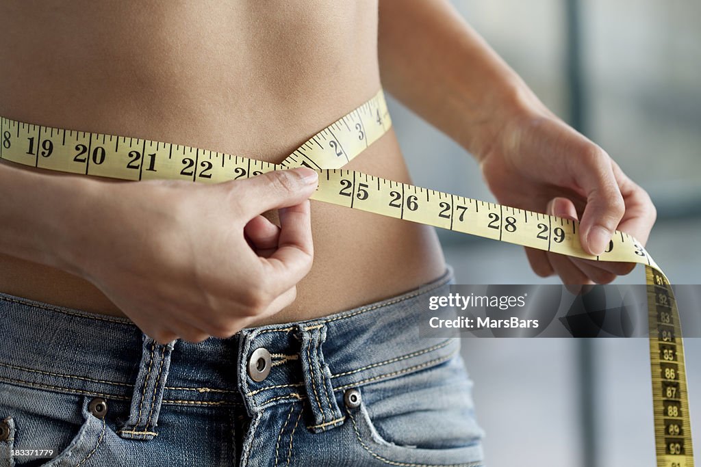 Measuring waist close up