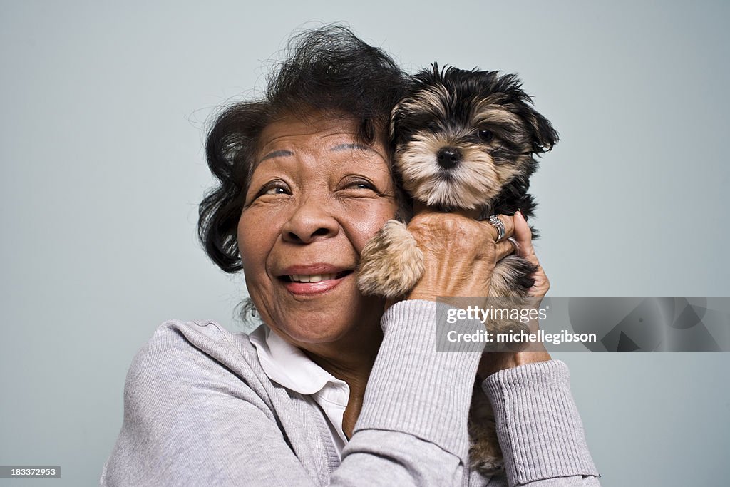 Senior Woman and a Puppy