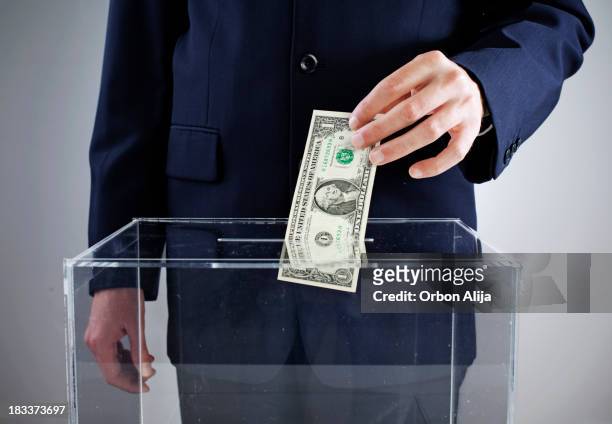 bribe - ballot box money stock pictures, royalty-free photos & images