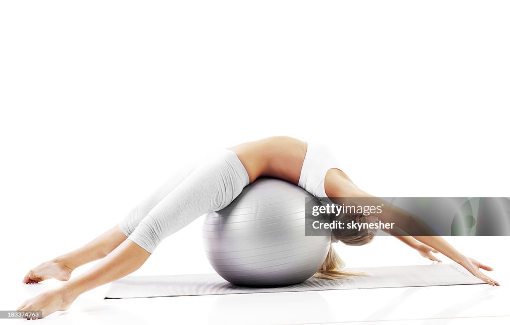 Beautiful blonde girl exercise Pilates.