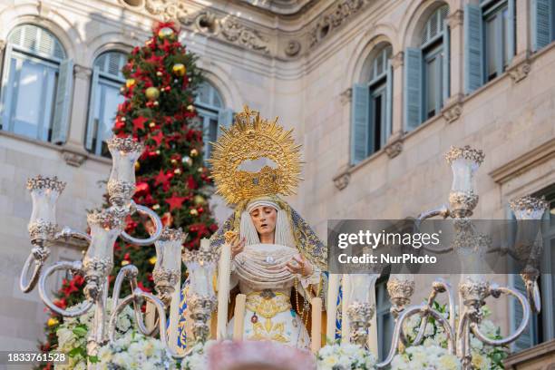 The procession of the Immaculate Conception is parading through the city center on the day of the Immaculate Conception, the patron saint of Spain,...