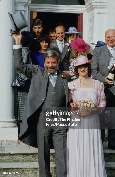 British actor Oliver Reed and his wife Josephine Burge on their wedding day, at the register office in Epsom, Surrey in England, on 7th September,...