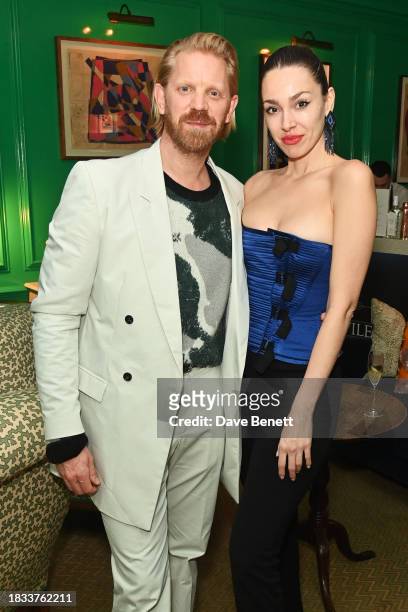 Alistair Guy and Berenice Gonzalez attend Alistair Guy's birthday cocktail party at Hackett London, Savile Row, on December 8, 2023 in London,...