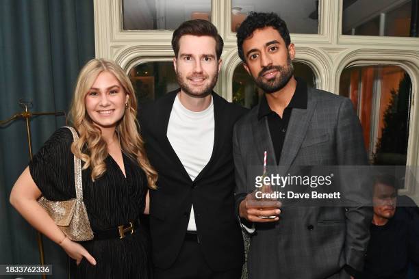 Helena Hillberg, Michael Hillberg and Cyrill Ibrahim attend Alistair Guy's birthday cocktail party at Hackett London, Savile Row, on December 8, 2023...