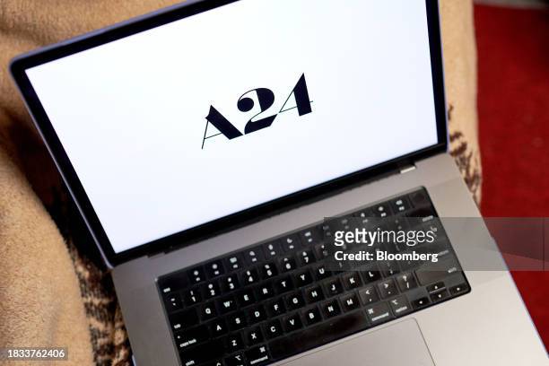 The A24 logo on a laptop computer arranged in New York, US, on Friday, Dec. 8, 2023. Independent film company A24 will run its new movies exclusively...