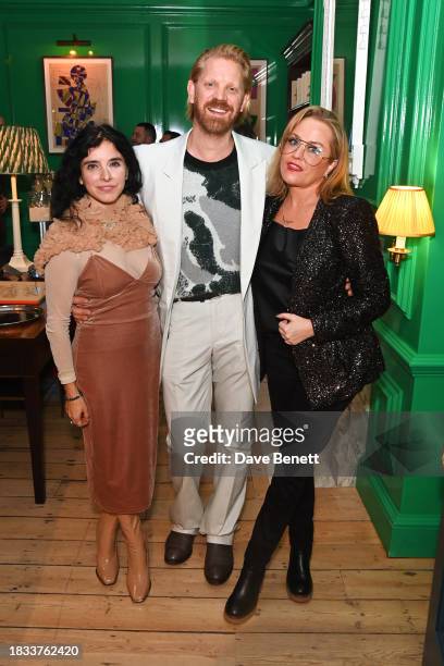 Maria Jose Bavio, Alistair Guy and Erica Bergsmeds attend Alistair Guy's birthday cocktail party at Hackett London, Savile Row, on December 8, 2023...